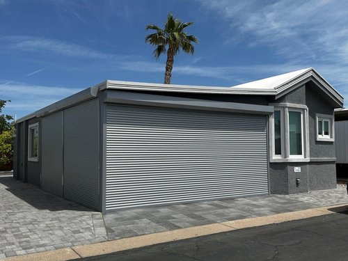 carport with closed rolling shutters