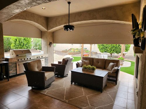outdoor kitchen with opened rolling shutters