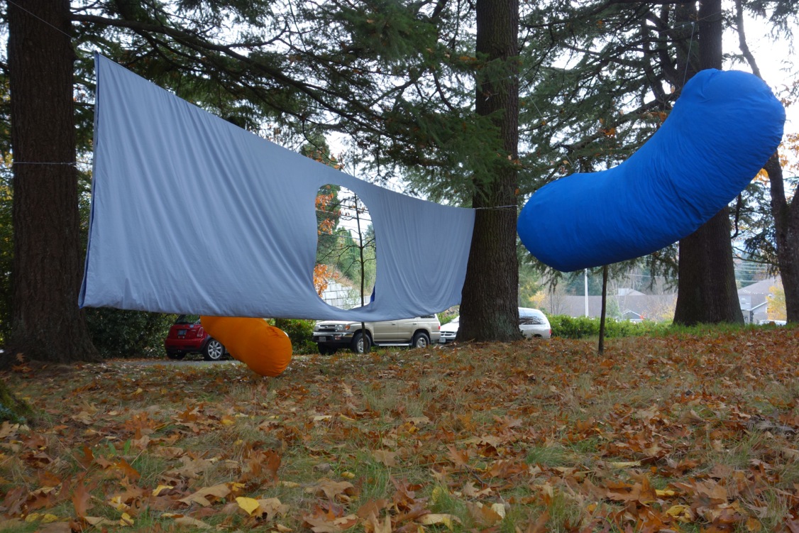 ORANGE INTERACTING WITH BLUE THROUGH A BARRIER (2013) installation view 2