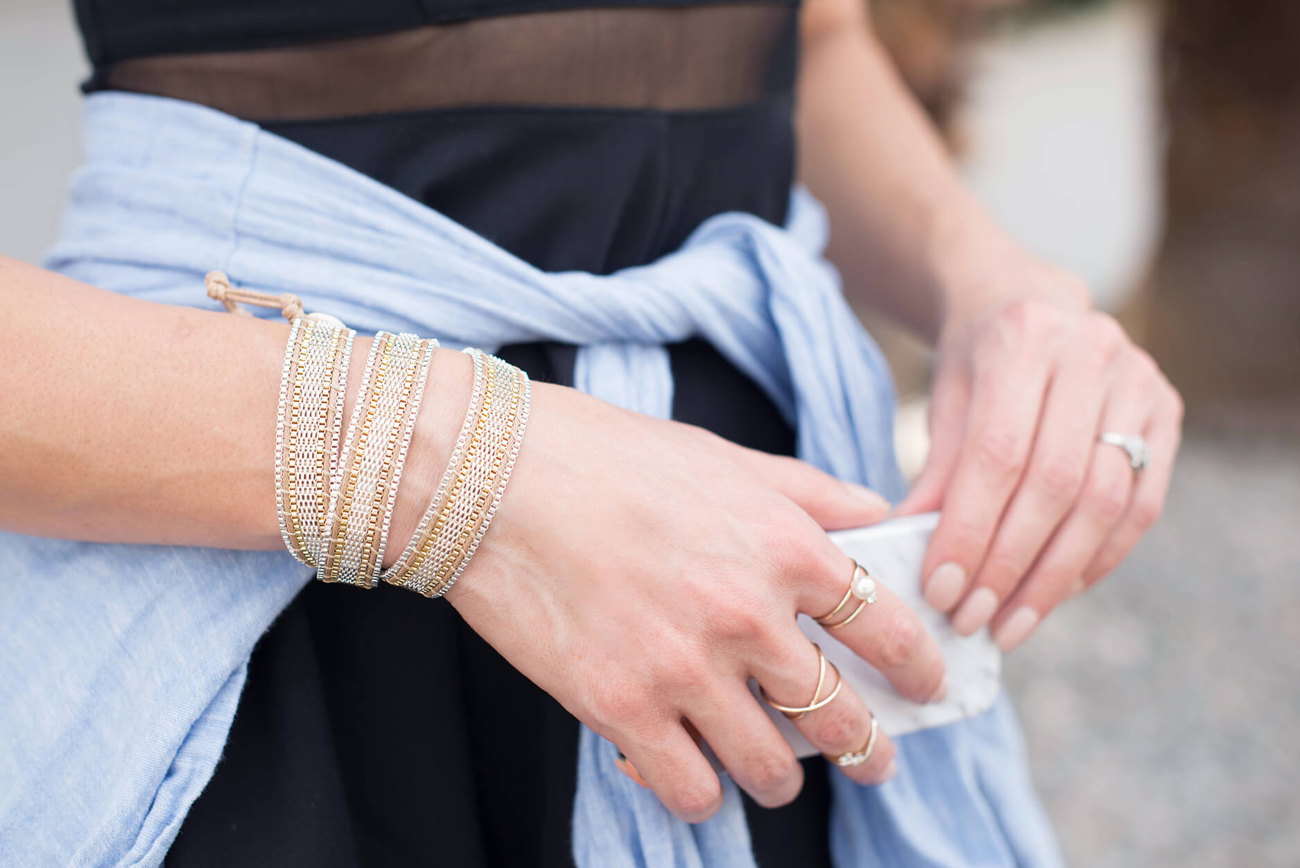 Bracelets, rings and iPhone case details