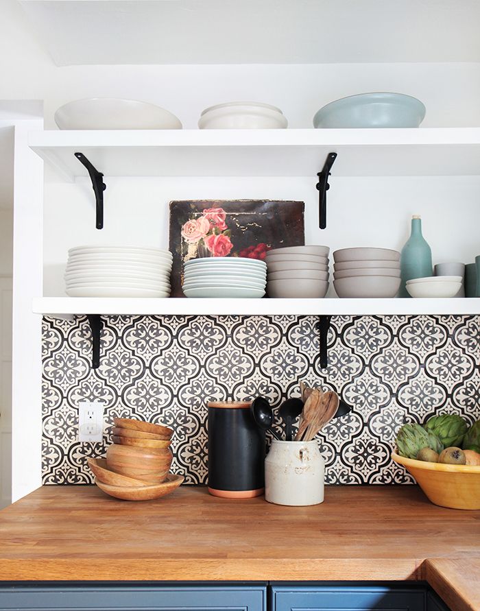 open shelving with Spanish tiles