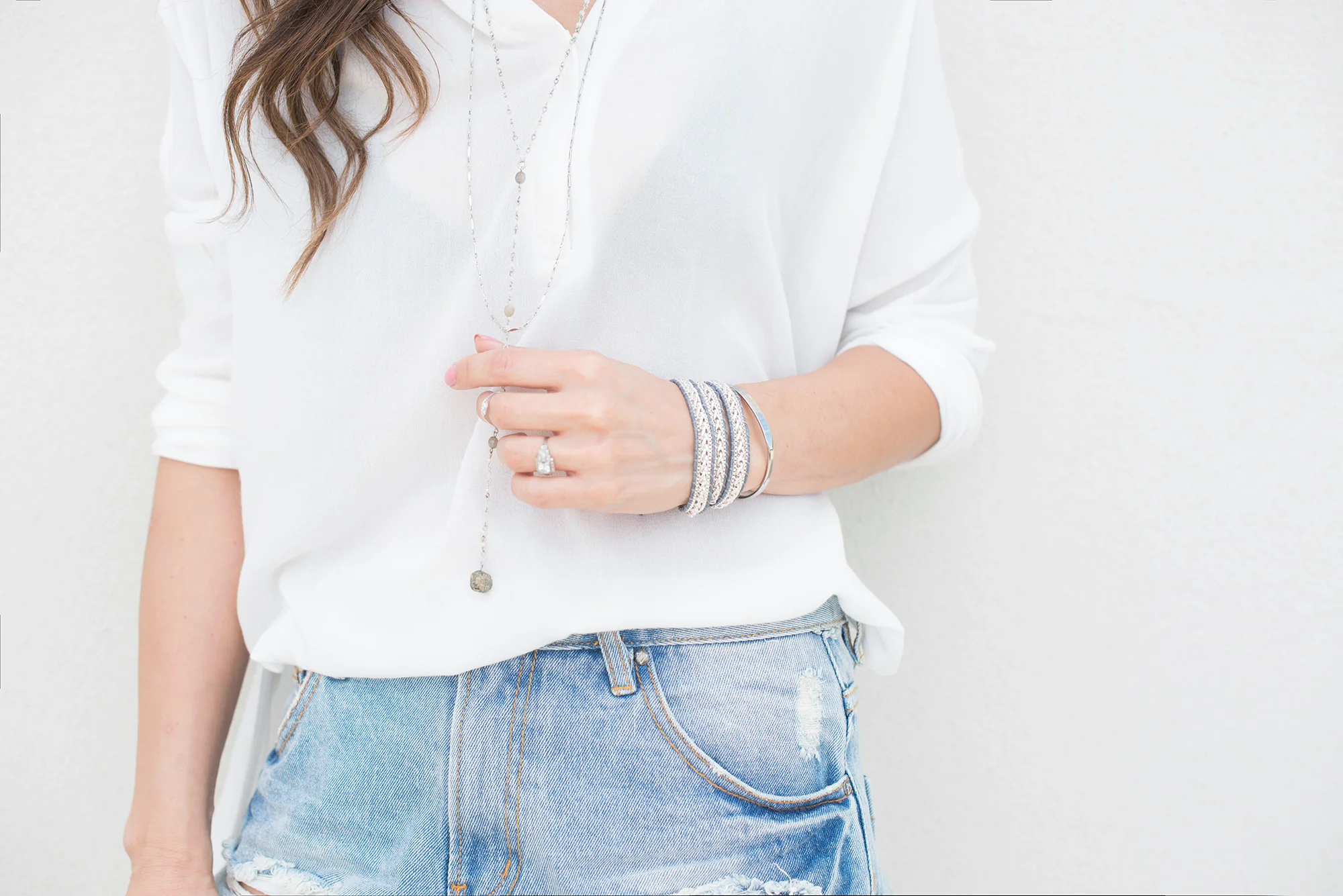 white shirt and denim shorts