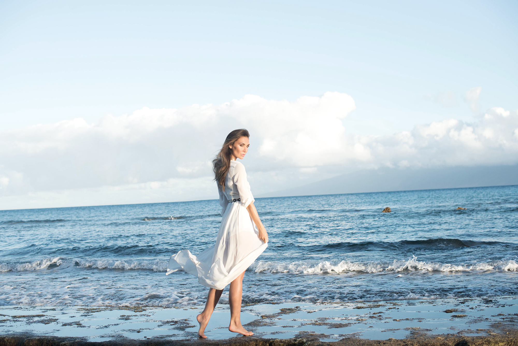 romantic white gown by the ocean