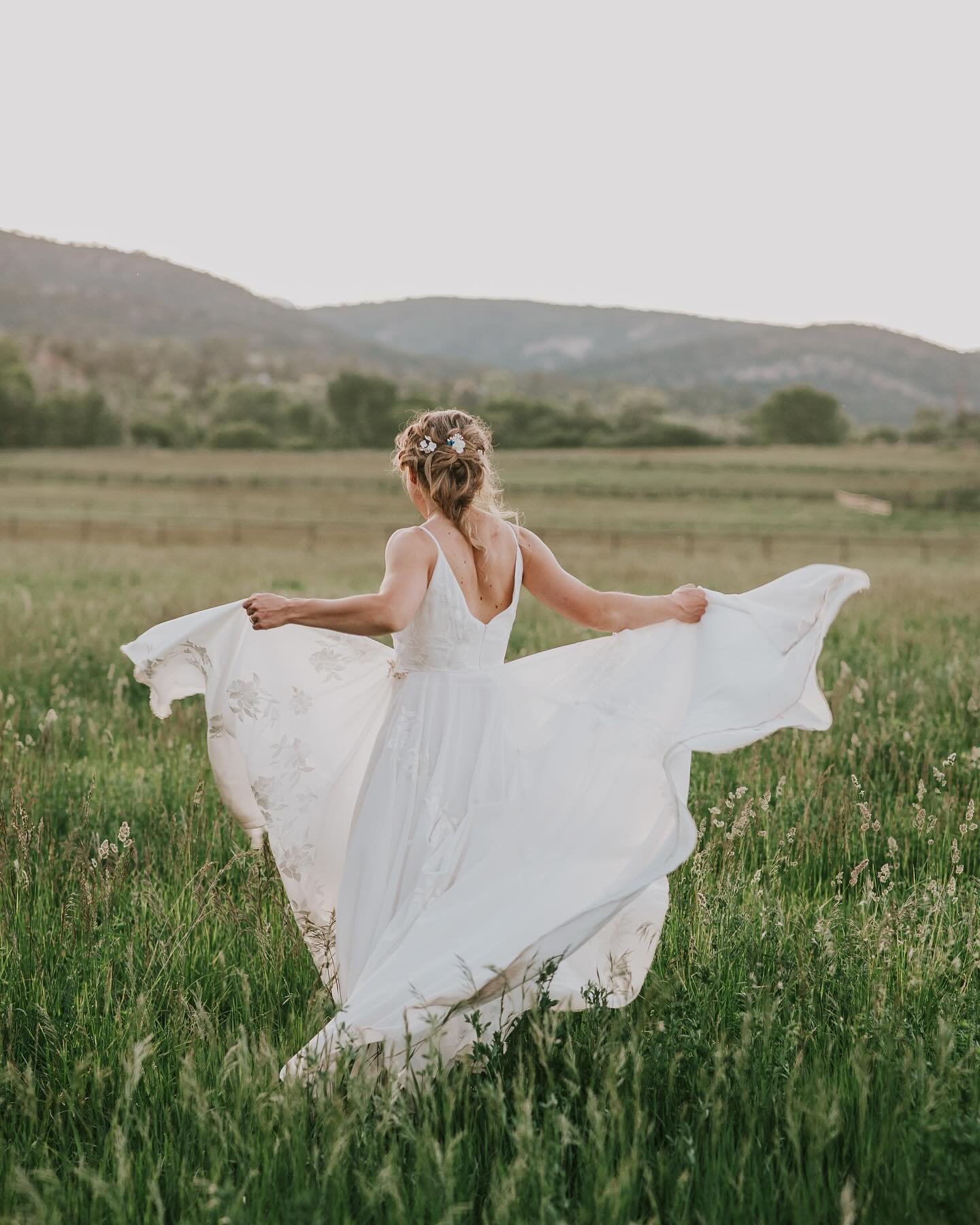 A moment for Elix, her dress, the gorgeous sunlight, and the pure bliss she felt on her wedding day. ✨ 

#coloradoweddingphotographer #weddingphotographer #coloradoelopement #coloradowedding #authenticlove #durangocolorado