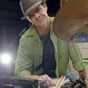 Dylan Bassett -Percussion. Dylan is a composer, percussionist, and teacher. He has been playing percussion for over 20 years and holds a B.A. in Music. His 17 years of experience teaching include work with the Missouri Fine Arts Academy, Drury University, Webster University Dance Institute, Missouri State University, the Missouri Arts Council, Gash Voight Dance Theatre, Americana Music Academy, and out of his private studio. Dylan teaches private lessons in drum set, snare drum, keyboards, congas, djembe, orchestral and marching percussion, as well as traditional African, Cuban, and Brazilian drumming. He has performed in numerous jazz, rock, African, blues, and fusion bands throughout the U.S and in Africa. Dylan is currently directing the KU African Drum and Dance Ensemble and performing with the afro-jazz-funk band SUNU and various jazz bands in the area