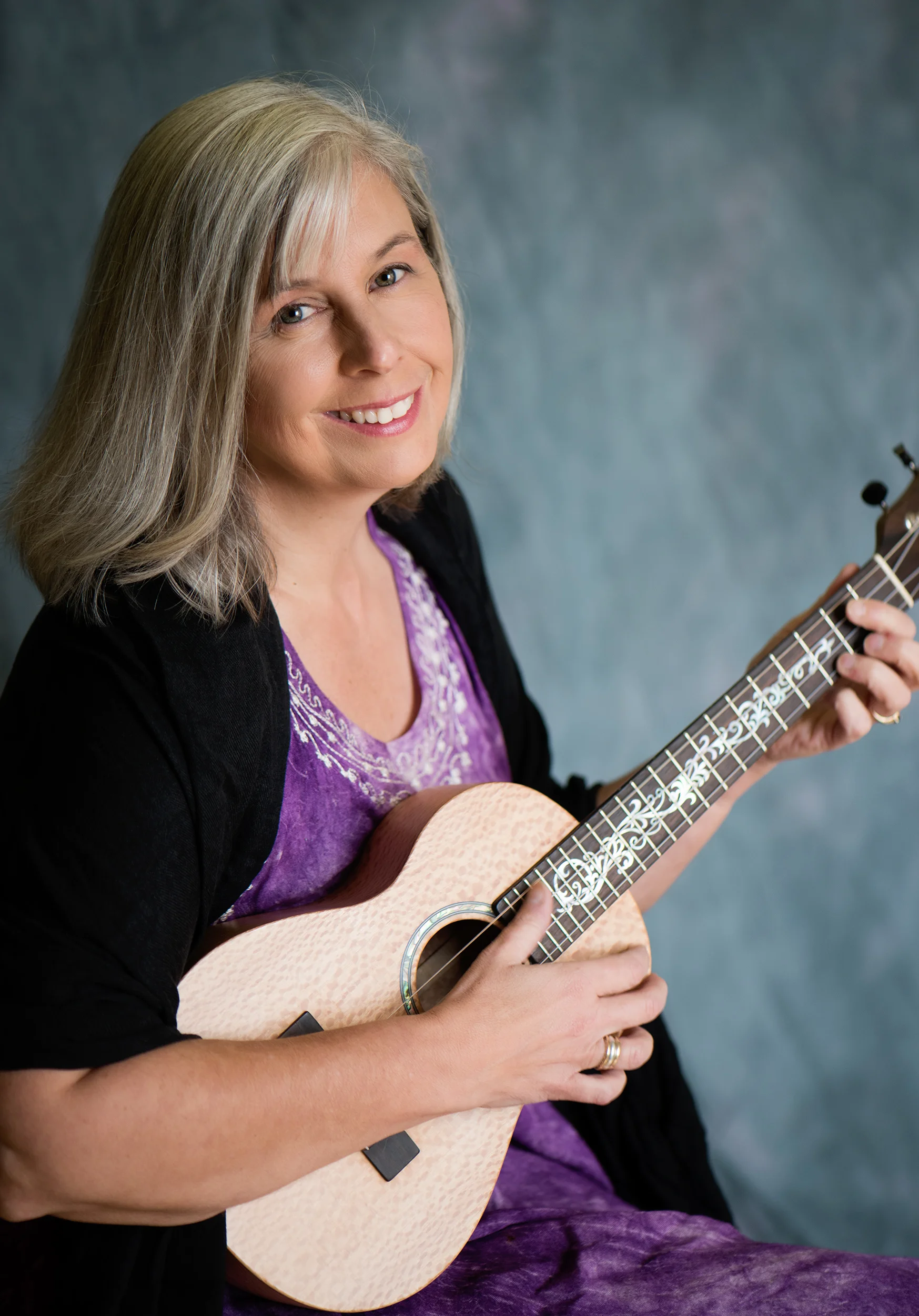 Linda Tilton - Ukulele Linda got interested in playing ukulele when she regularly attended old-time music jams. Tired of being an observer, Linda mentioned to a friend that she wished she had a banjo ukulele to play at the music sessions. Two years later that friend surprised her with a Christmas gift of a 1926 Sears and Roebuck banjo ukulele – the $3 model! Since 2006, Linda has been a performing member of the Kansas City Ukesters, a ukulele club in Mission, Kansas. She also teaches ukulele workshops at the Walnut Valley Festival in Winfield, Kansas. Linda's classes focus on beginning and intermediate students who play soprano, concert and tenor-sized ukuleles. These sessions are tailored to the preferences and interests of the student. Beginning sessions include tuning, entry-level songs, how to learn and remember new songs, and jamming etiquette. Intermediate classes include: songs using more advanced chord progressions, transposing and strum patterns.