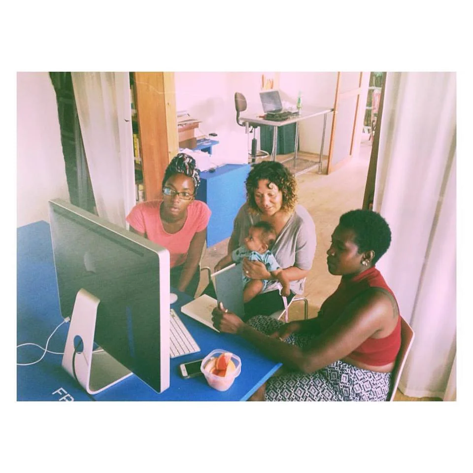 Chatting with local artists Anisah Wood and Versia Harris.