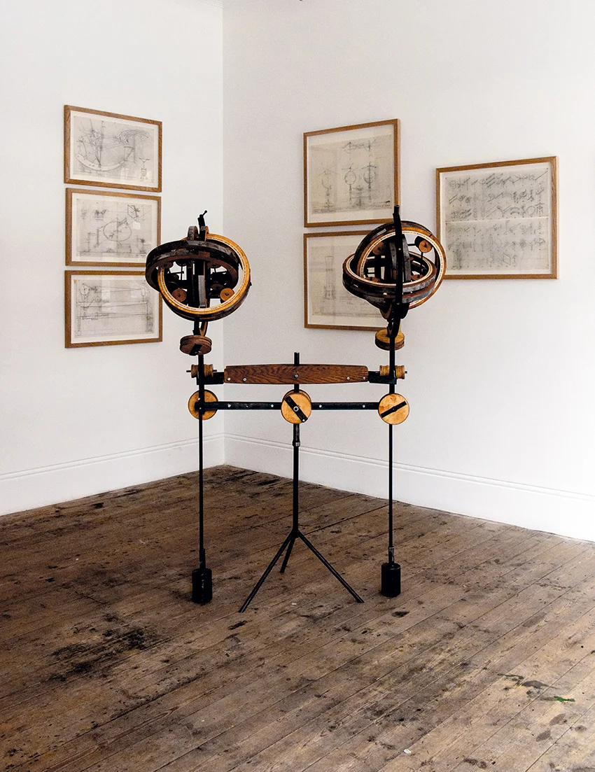 Double Globe , 2019, wood, steel, printed tracing paper