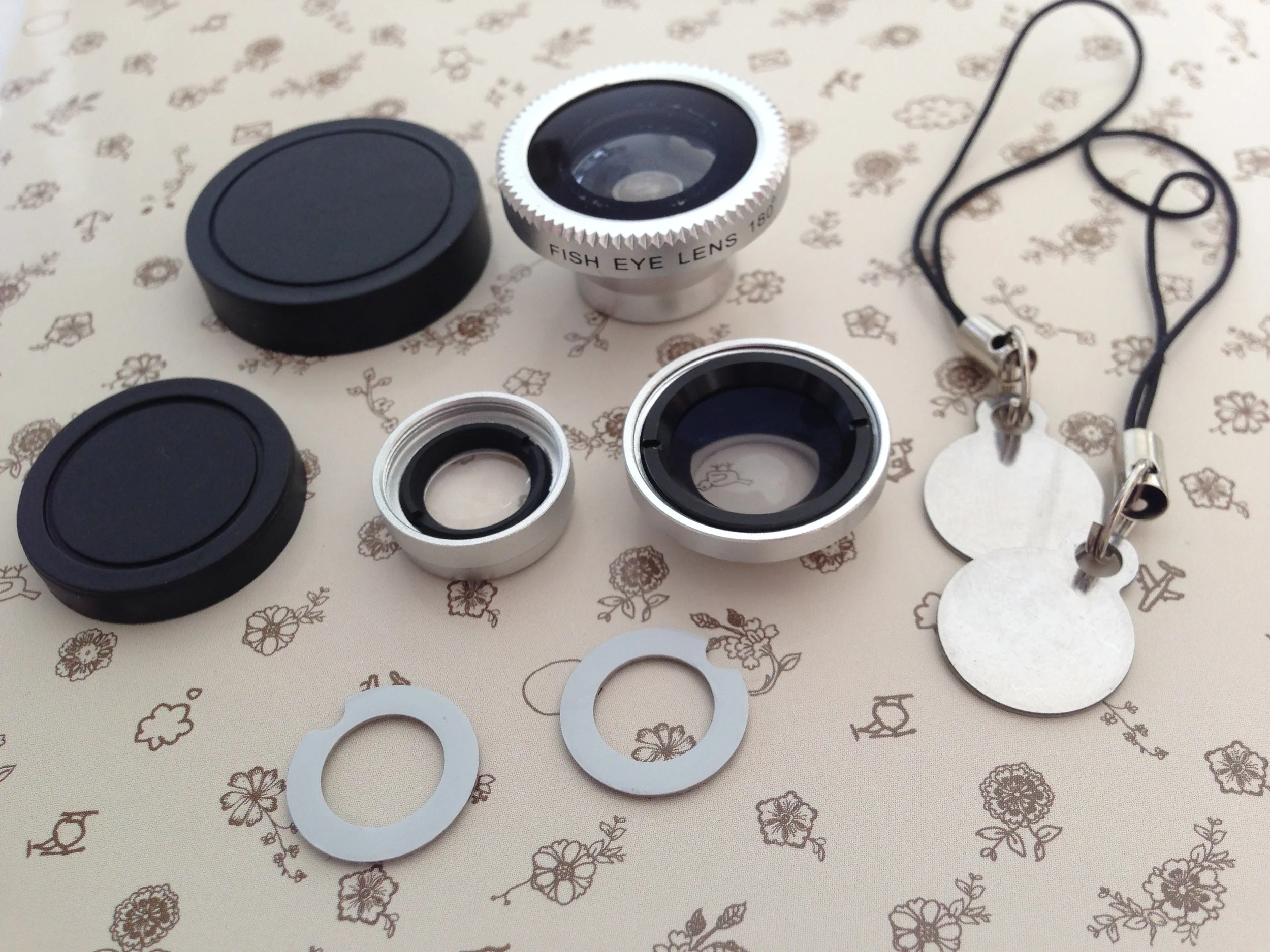 This is what you get: 3 lenses: wide angle, macro and fish eye (macro lens can be detached from wide-angle), 2 lens covers, 6 detachable magnetic rings and 2 magnetic key chains. 