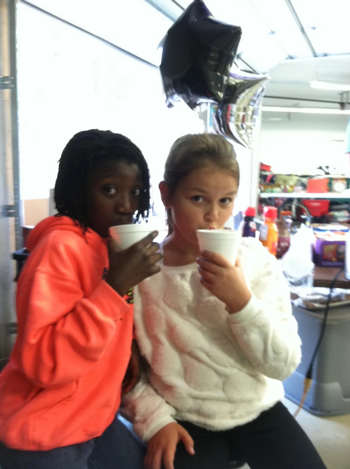 Travis's sister, Blessing {left} and his cousin, Greta {right} were SO sweet. They wanted to donate their toys and do whatever they could to help bring our baby home. They also created a concession stand to help raise funds. Nothing more beautiful than seeing little hearts that long to give and serve.