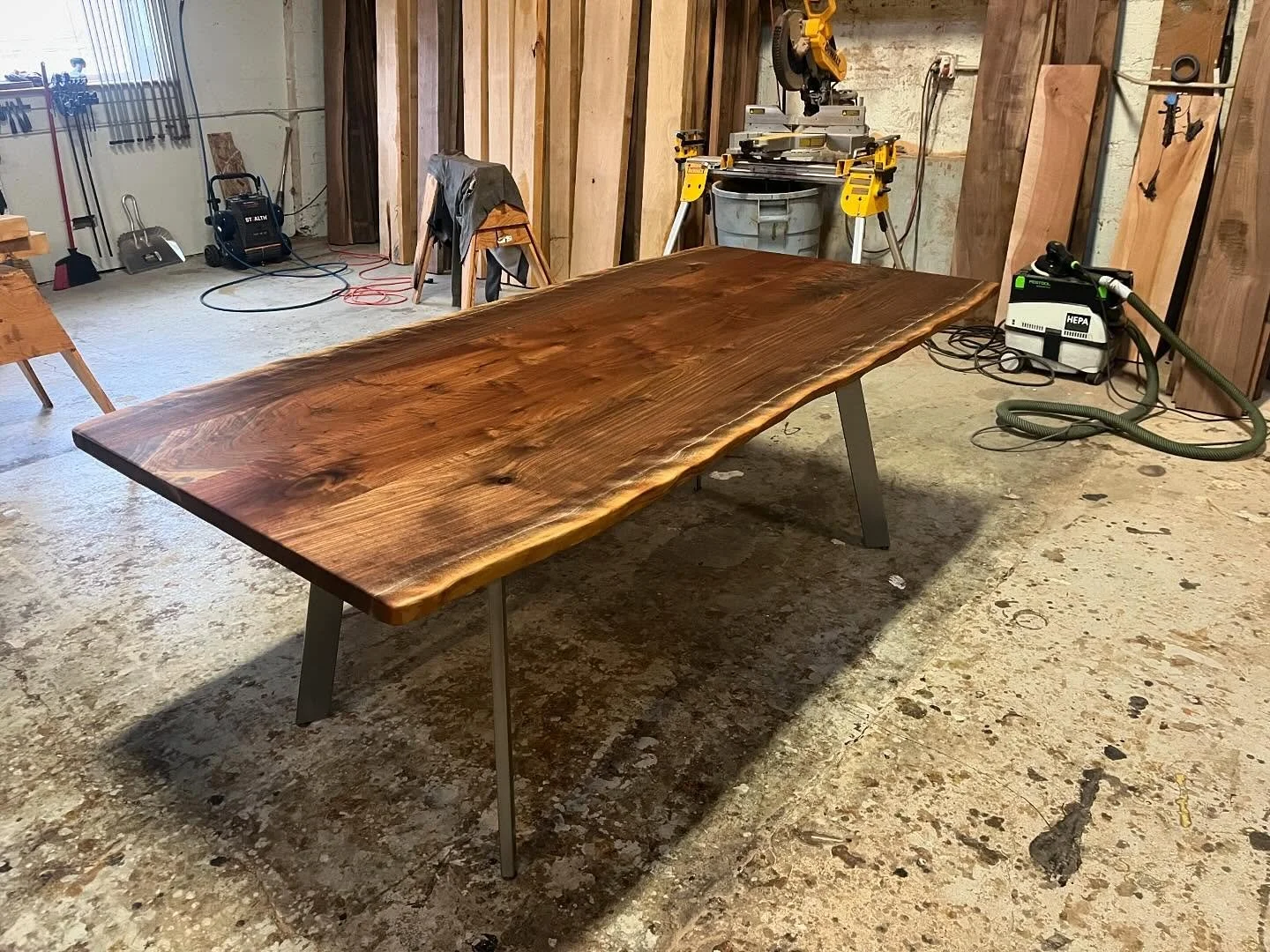 The latest table I made just for fun because the wood spoke to me. This one is finished and available now. 80&rdquo; x 40&rdquo; live edge Oregon walnut with tons of amazing figure and color. Currently featuring brushed steel blade legs but base can 