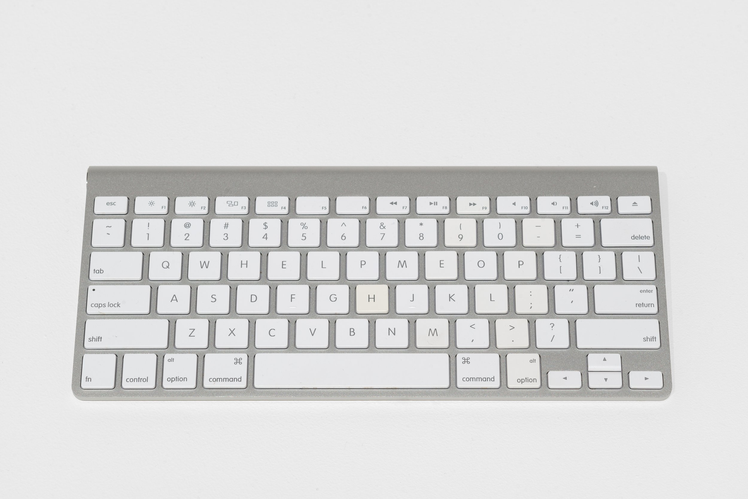   Maryam Jafri   Help Me Keyboard (No Lithium, No Work)  Edition of 3 + 2 AP 2023 Wireless Apple keyboard ½ x 11 x 4½ in. &nbsp; 1.27 x 27.94 x 11.43 cm MJ0149.1    Custom-modified keyboard spelling the phrase "help me".  