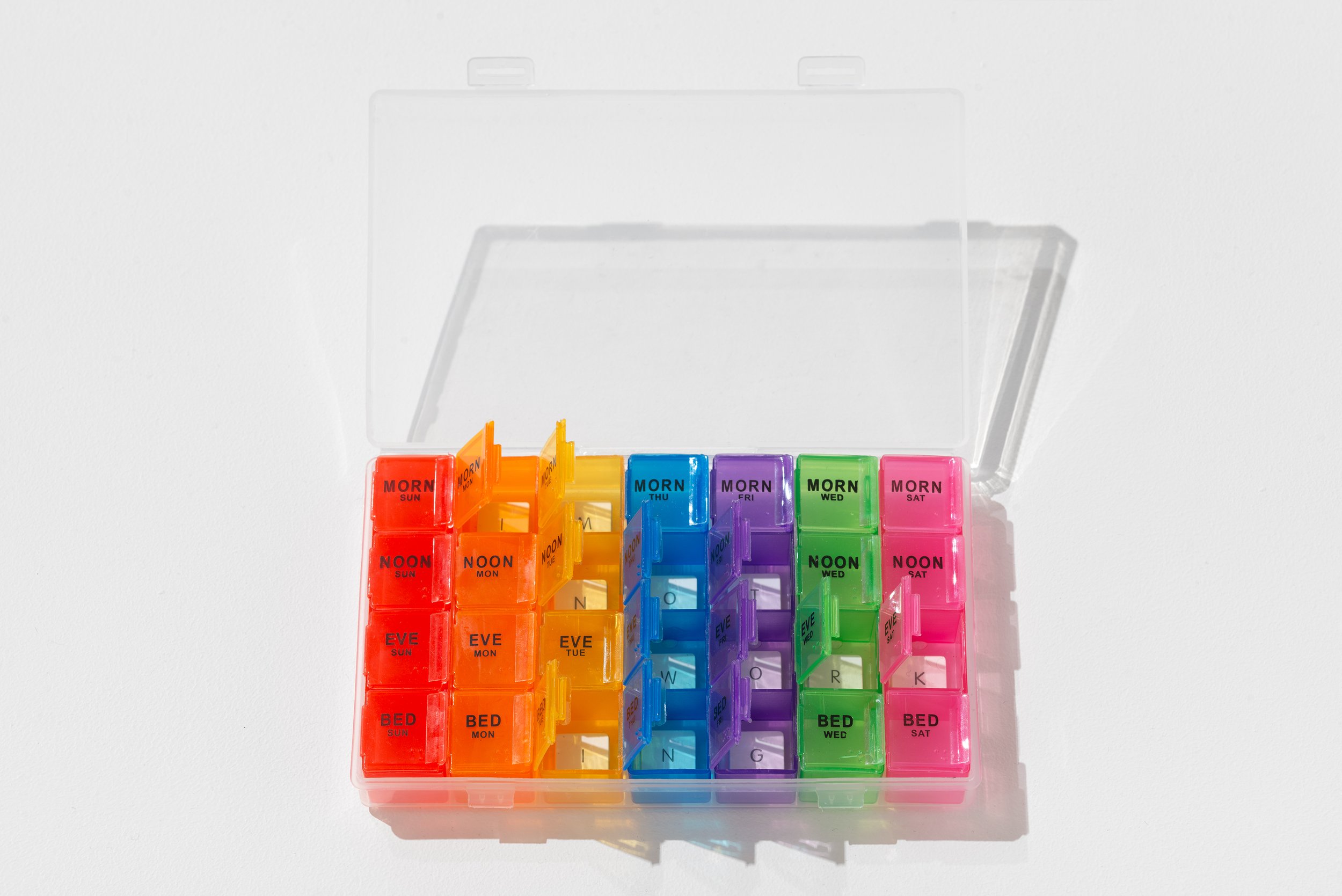   Maryam Jafri   I'm Not Working (No Lithium, No Work)  Edition of 3 + 2 AP 2023 Pill organizer, keyboard letters 2 x 9 x 5 in. &nbsp; 5.08 x 22.86 x 12.70 cm MJ0148.1    The white keys in the box spell the phrase "I'm Not Working." Overlaid with tha