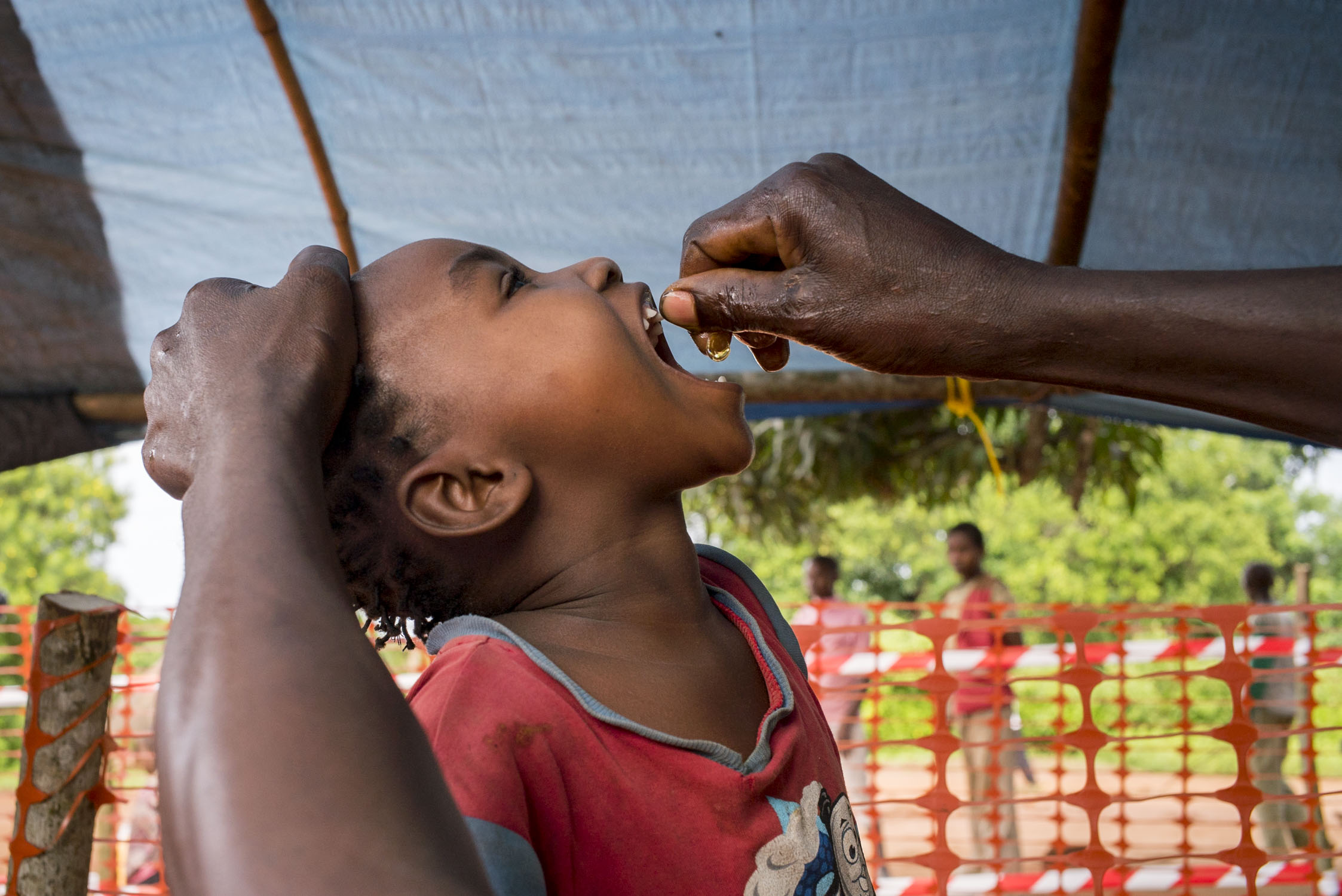  A young girl receives medicine during a 5-day measles vaccination campaign carried out by MSF in a region of Bas-Uele province of Democratic Republic of the Congo (DRC). MSF named measles among the top five epidemics that could erupt or worsen in 20