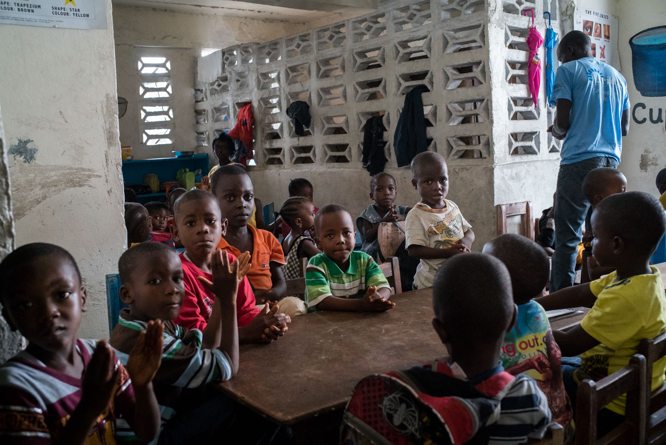  Children attend class in a recently opened and overcrowded Bridge school in inner city Monrovia. September 23, 2016. Monrovia, Liberia. 