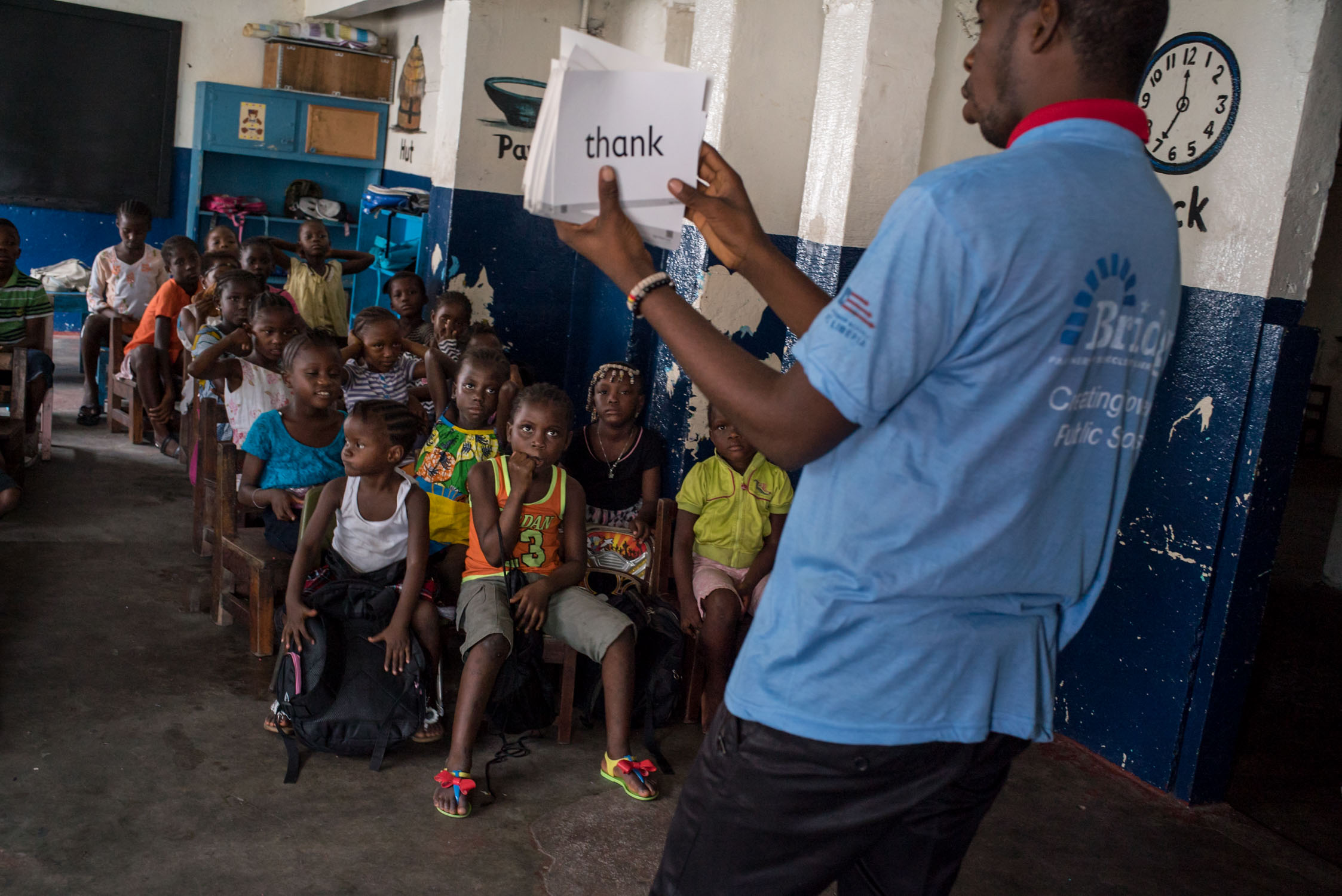  Children attend class in a recently opened and overcrowded Bridge school in inner city Monrovia. September 23, 2016. Monrovia, Liberia. 