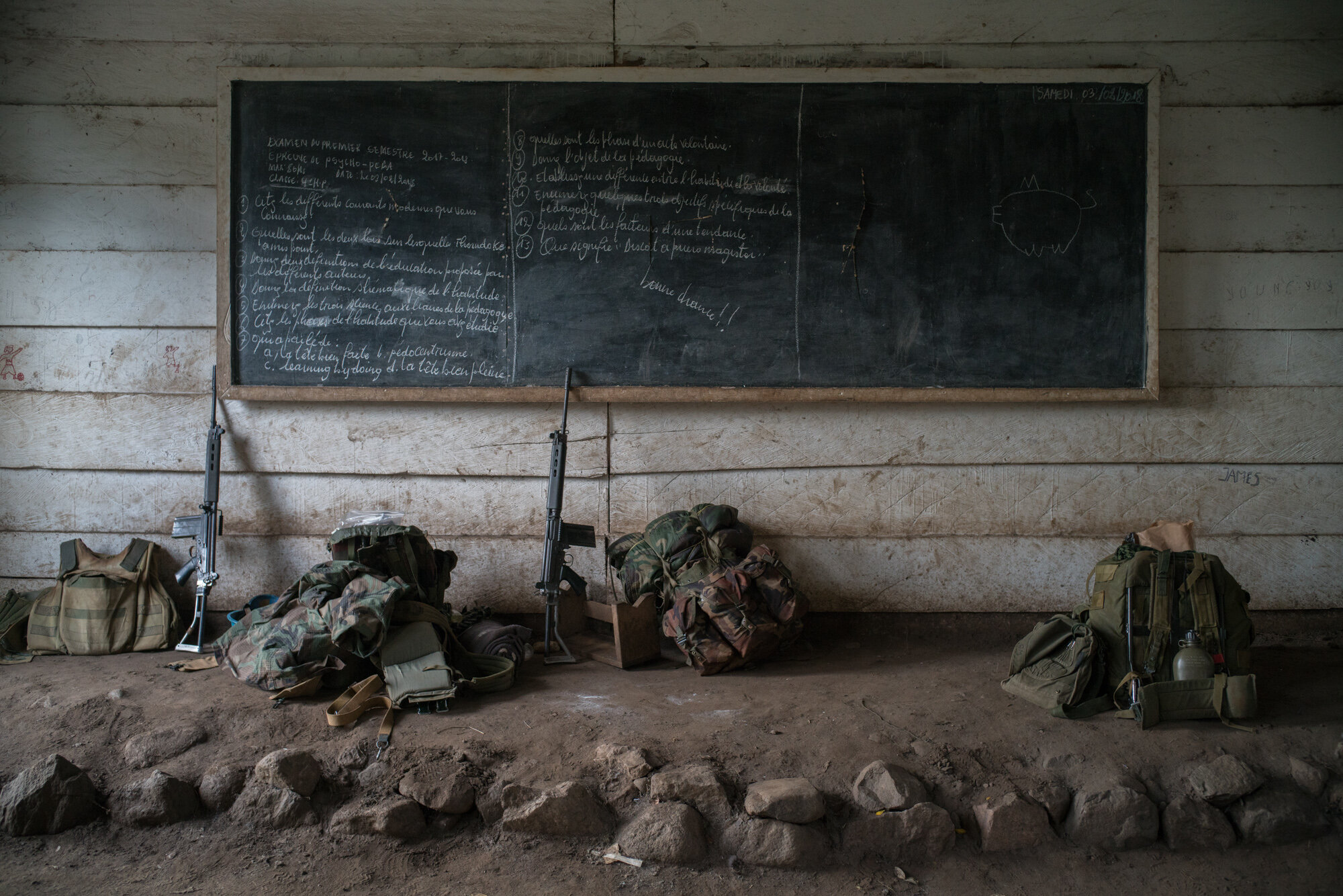  Uruguyan peacekeepers set up a makeshift base for the night in the abandonded school in Joo, one of the villages along the coast of Lake Albert, deserted and decimated after attacks on March 12 that left a reportedly 42 people massacred across the v