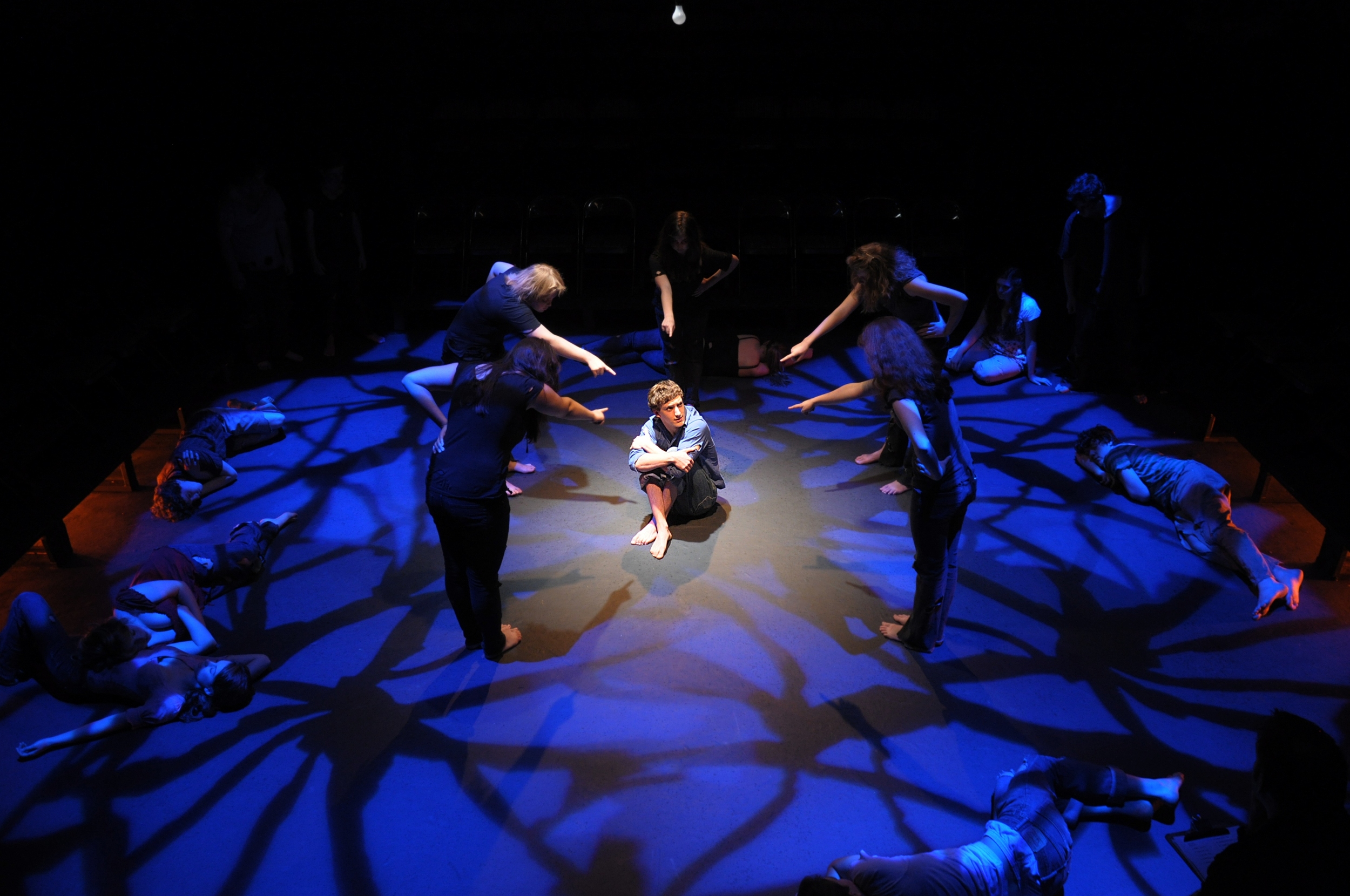 Noah Kaufman as Manny with members of The Fire and The Trapped in Little Manny