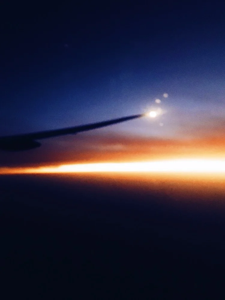 While everyone else is asleep, I snuck a photo of the sunrise over Africa