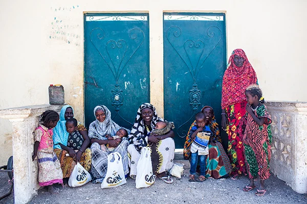 Several of the women who received rice and beans at the distribution
