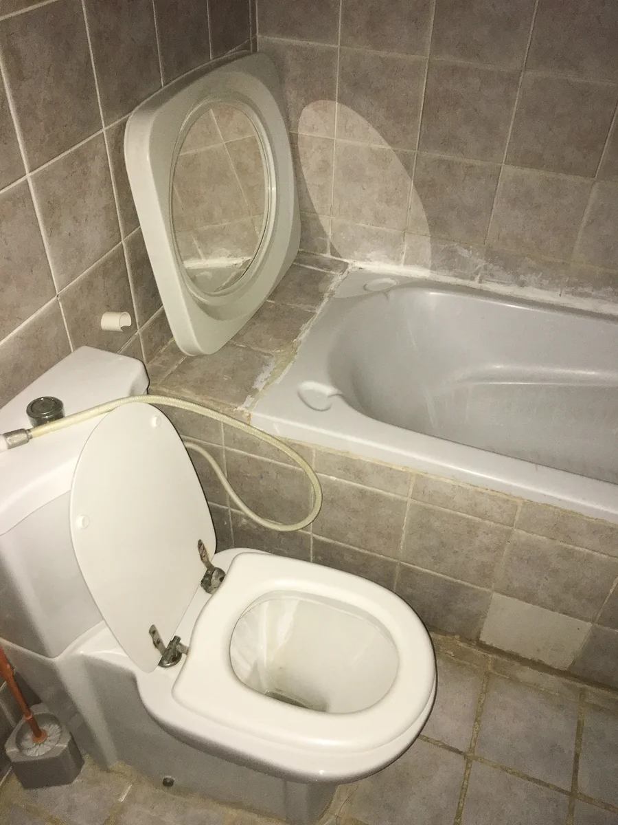 The before photos of the master bathroom, trust me, the decor did wonders for this space
