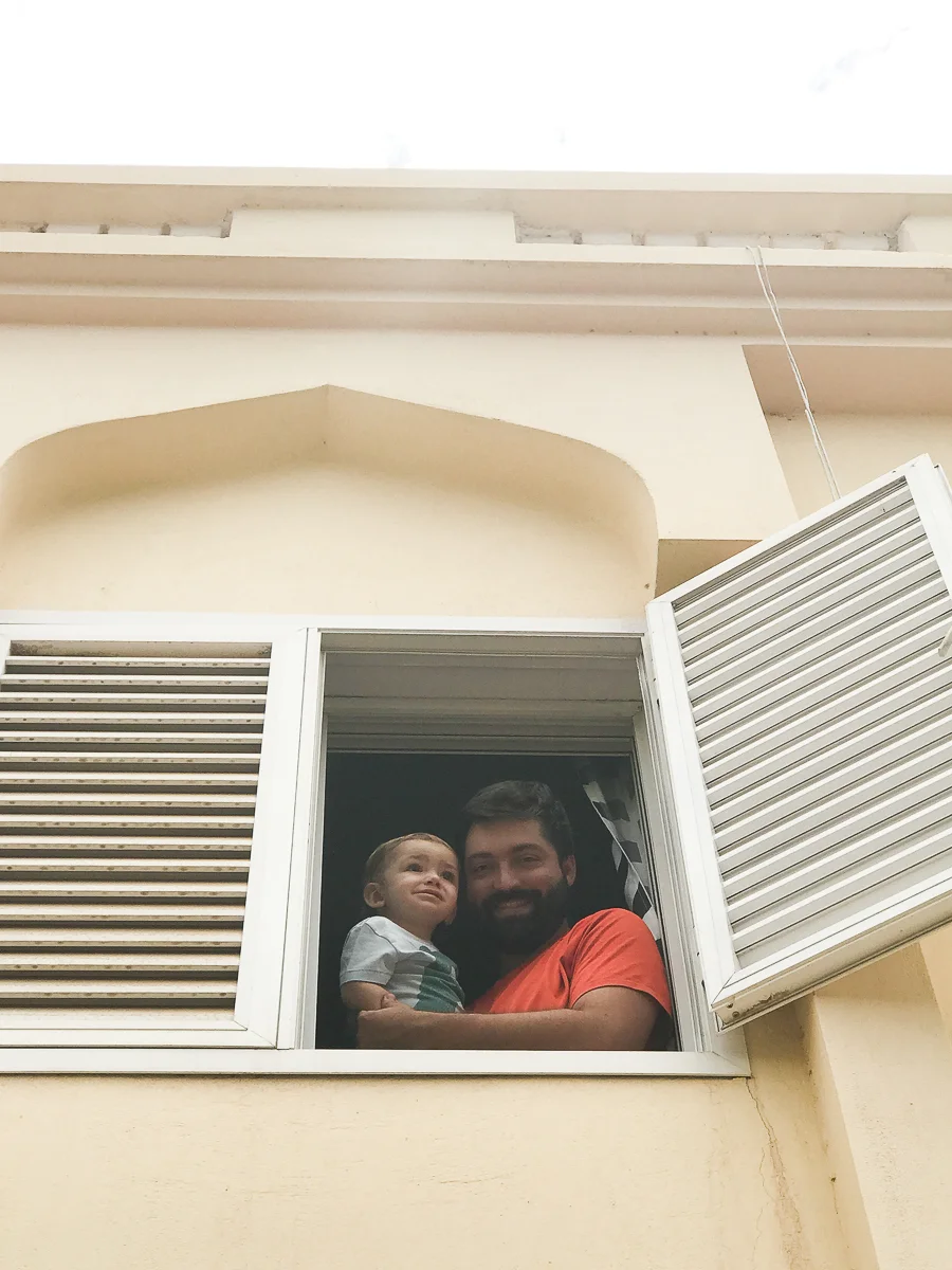 Daddy and Ezra hanging out of the window of the office