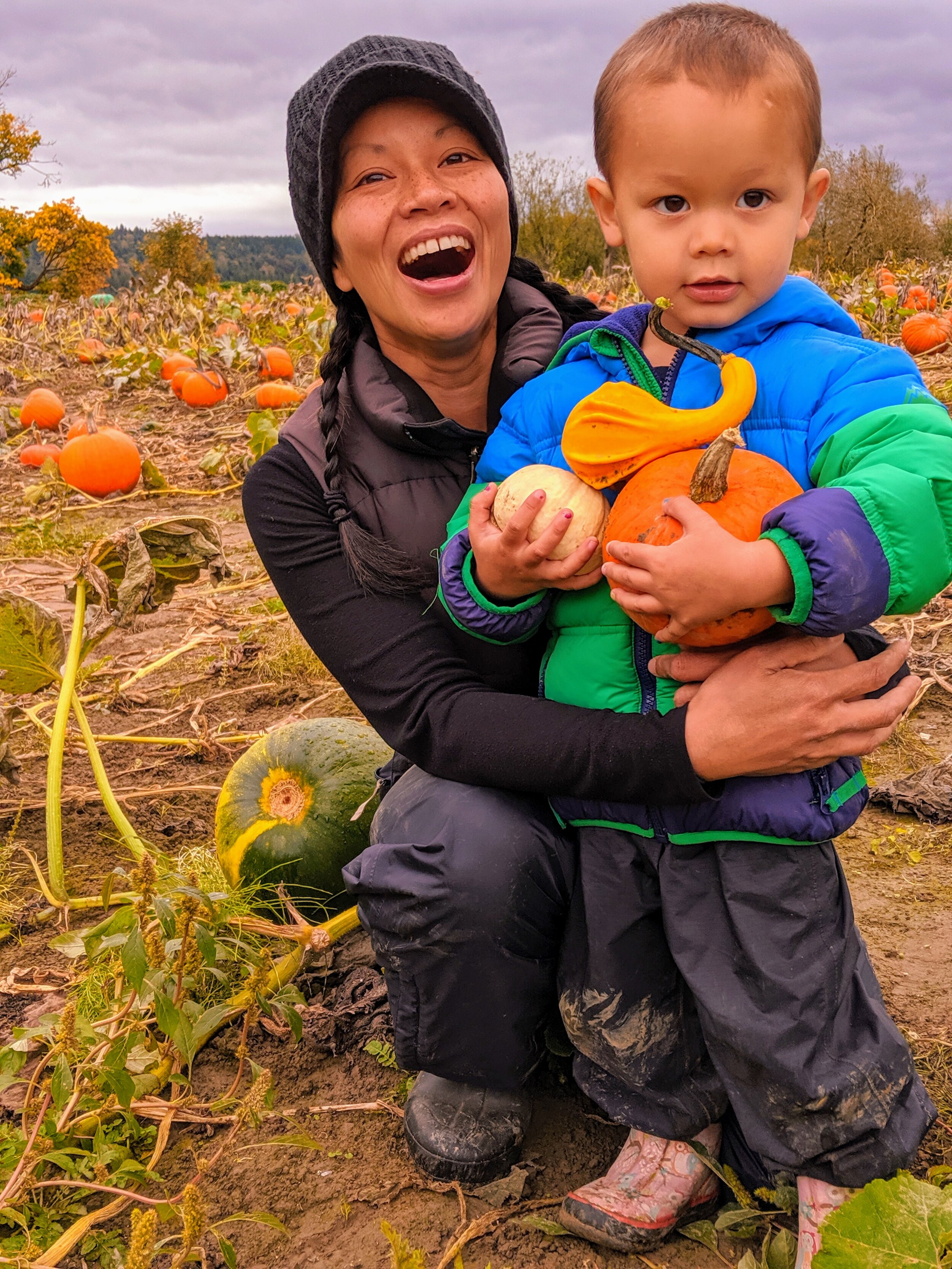 Mom and child with pumpkins.jpg