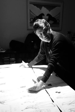 Zang at work, laying out his looks for a runway show.