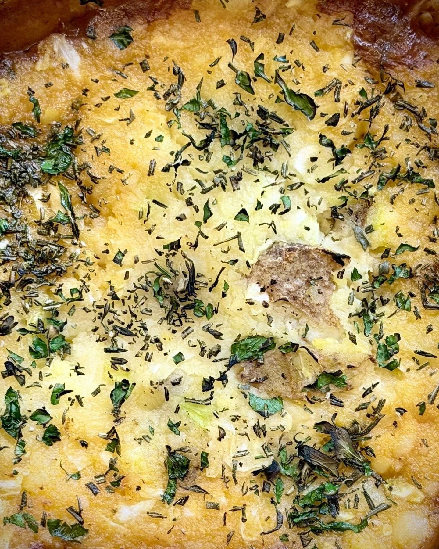 Hope everyone had a wonderful and festive St. Patricks Day. 
No time for corn beef with the little one at home so we had another one of my favorites Shepards Pie.

It may not look like much, but under those crisped potatoes lay a bath of rich lamb an