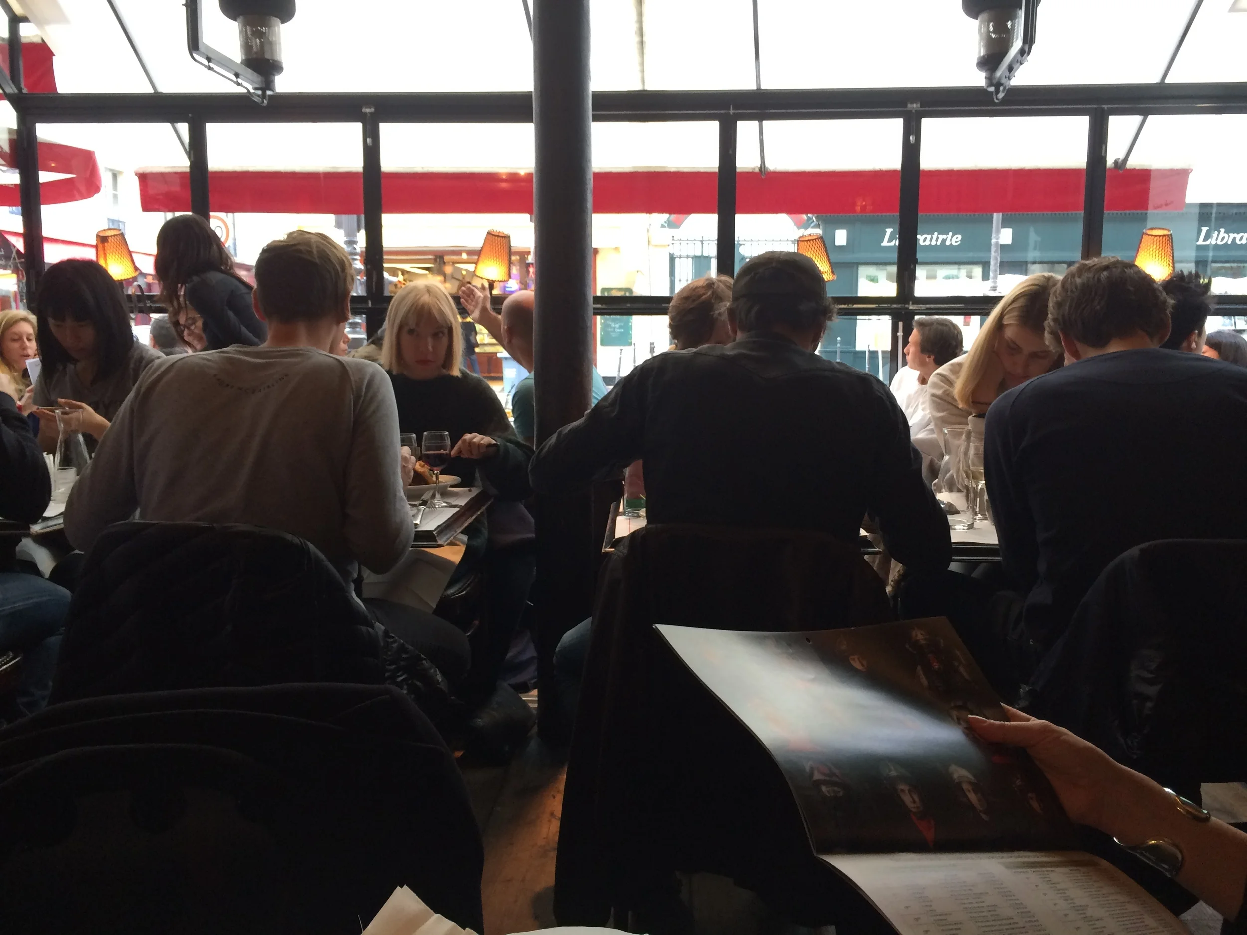 A Crowded Café Charlot - and Lisa admiring her new calendar. 