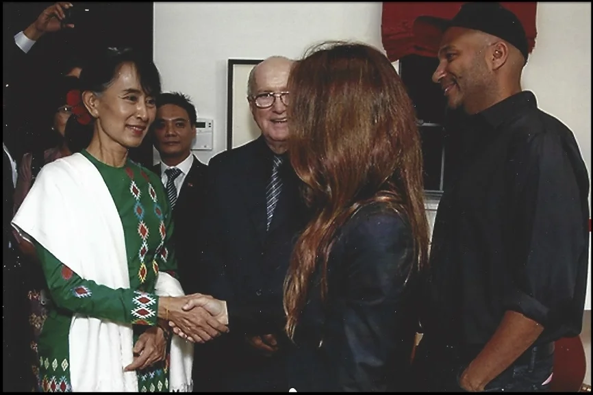 From Left: Aung San Suu Kyi meeting with Tom Morello and wife at the Aung San Suu Kyi dinner, 2012
