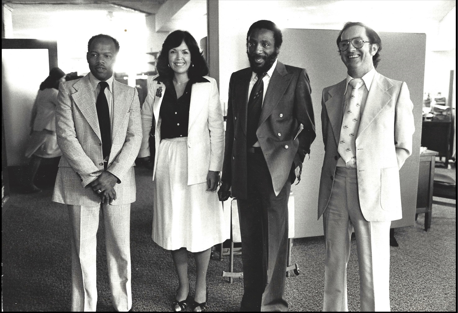 John Lewis, Mary King, Dick Gregory and Jack Healey pose for a photo on the day of Jack's appointment to the Peace Corps.
