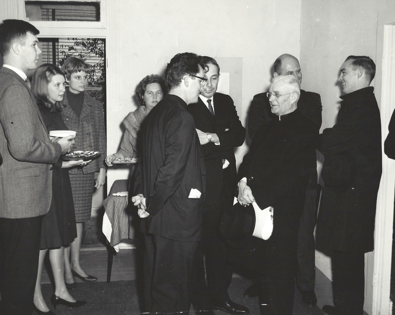 Cardinal Sheehan, Frank Murphy and the President of Frostberk State College meet the Newman Chaplan, Reverend Healey, 1967