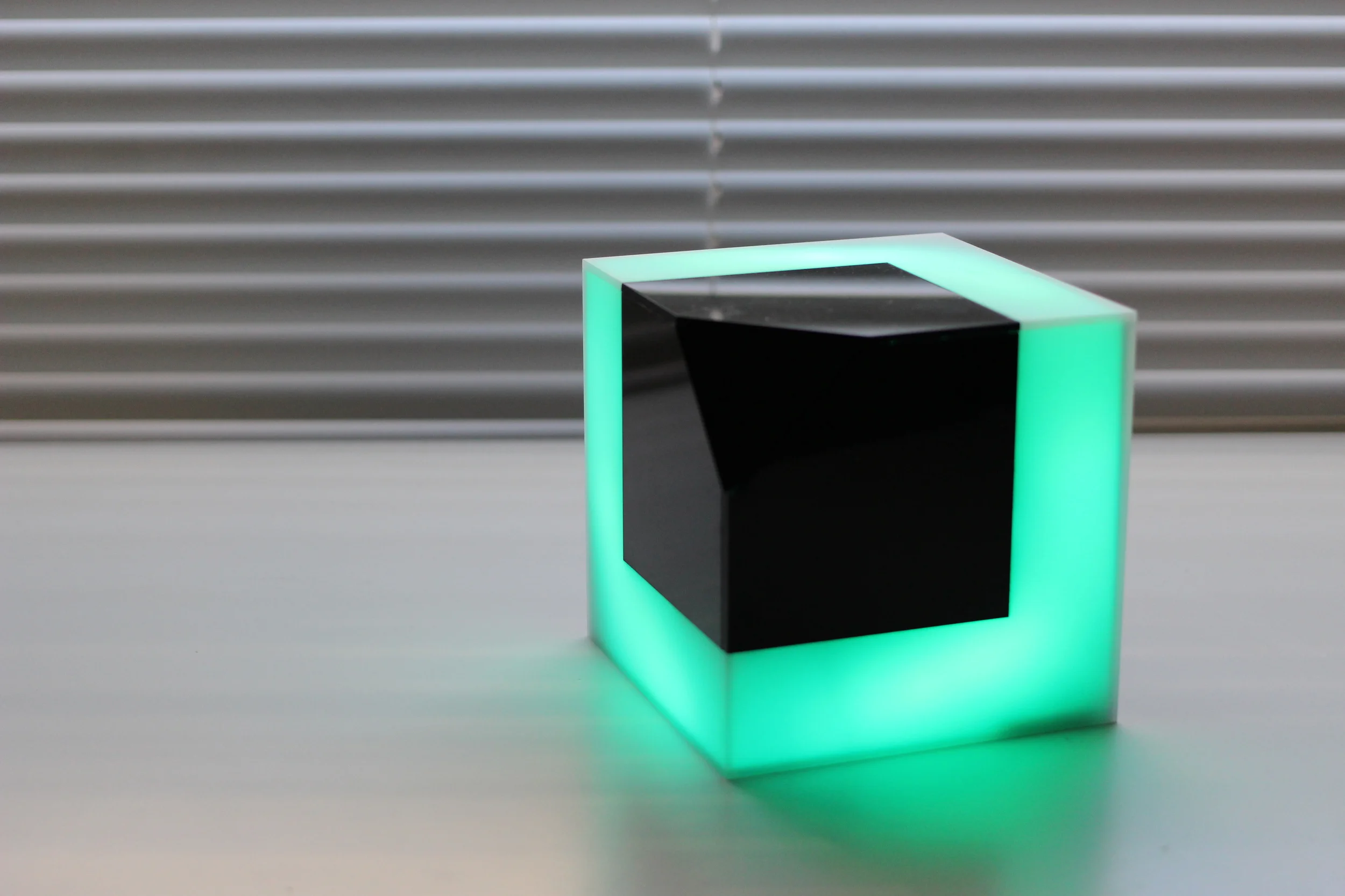 Object PIXELS has three side light emitting part creating illusion: 2D and 3D.