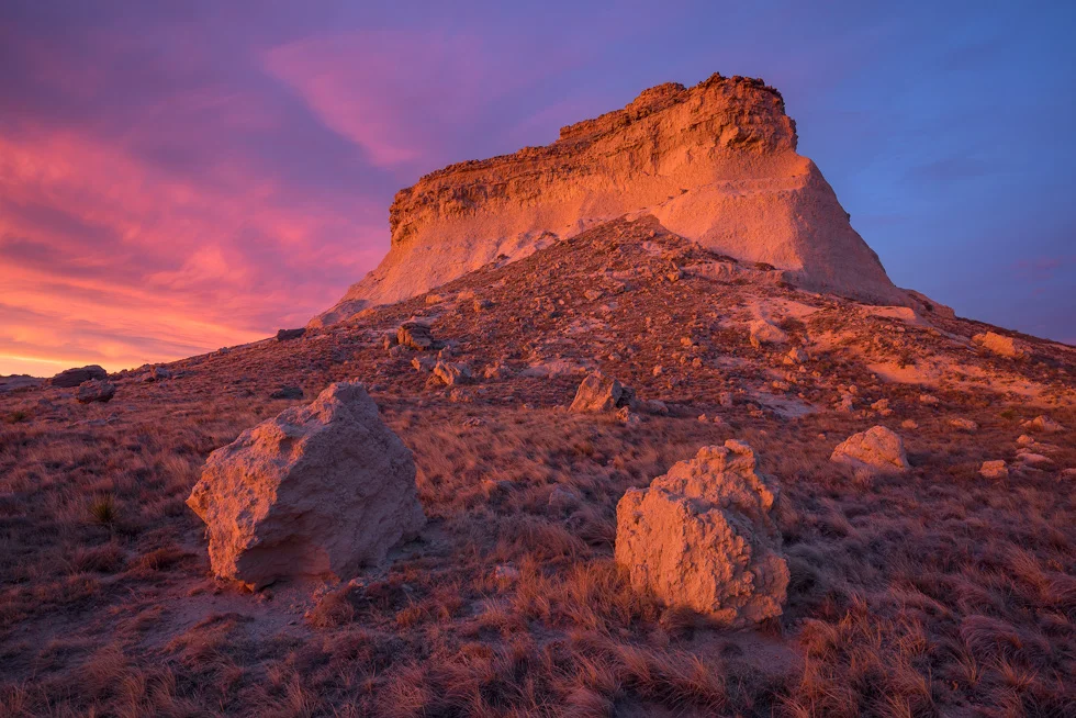 “Duality” - Warm sunrise light glows on the face of one of the Pawnee buttes. Pawnee National Grassland, Colorado.
