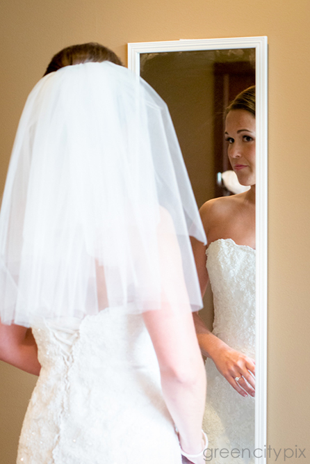 Checking the reflection one last time.