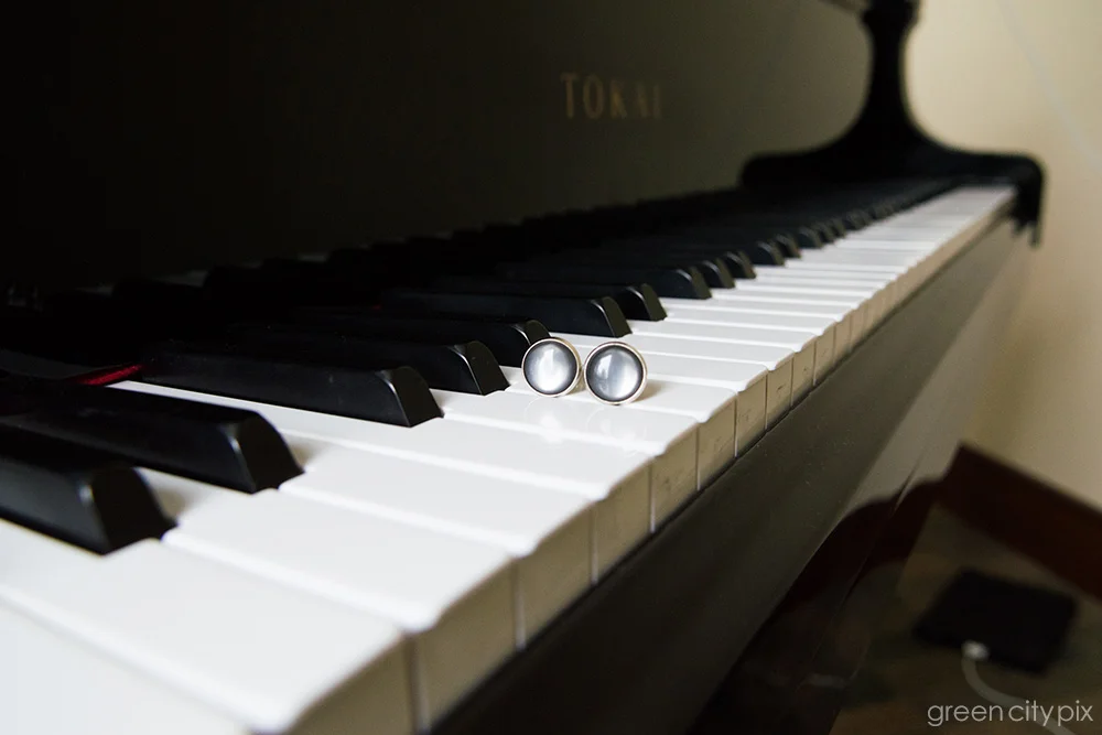 The groom's cufflinks.