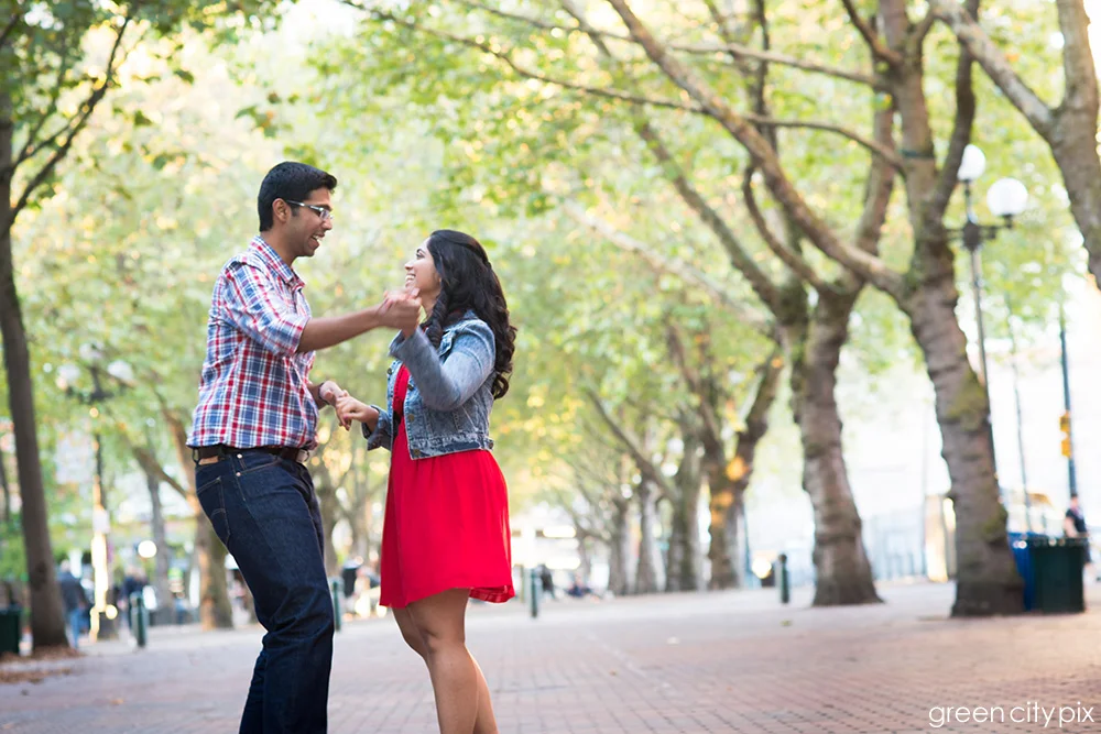 During the photo shoot, some musicians at the far end of the park started playing, and these two showed off their dance moves.