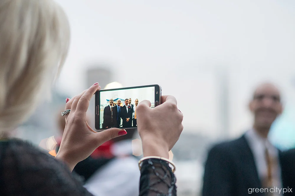 Of course, phone cameras were everywhere. I actually love taking shots of people taking shots of other people.