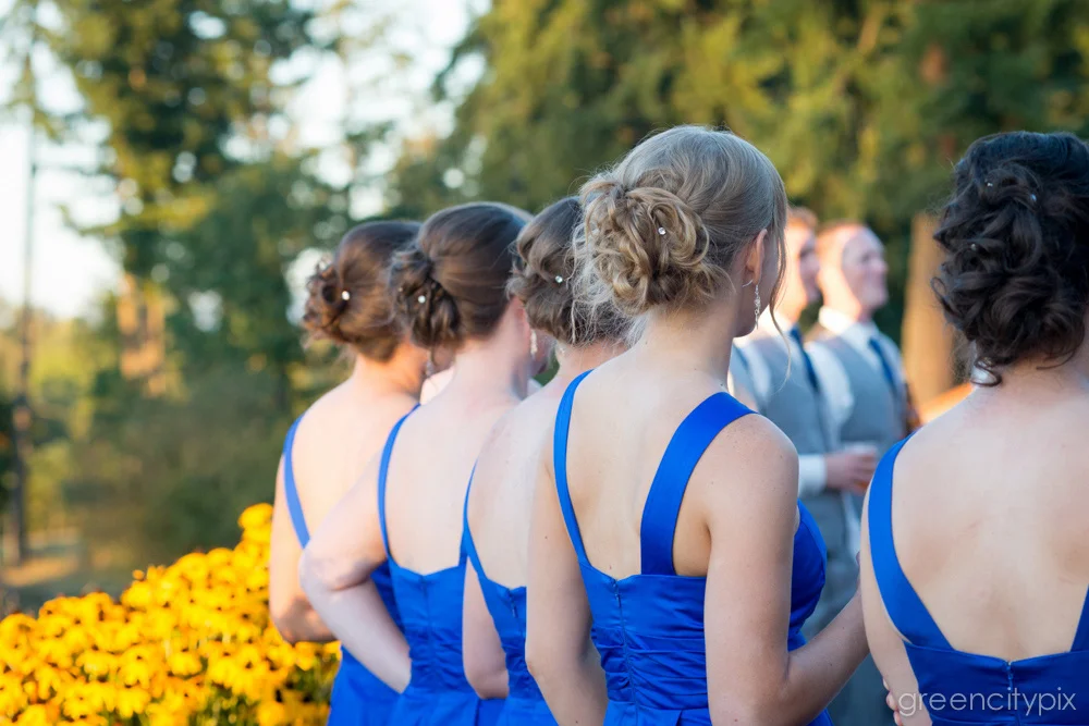 Up-do, I do. I love the loosely knotted up-dos on these bridesmaids.