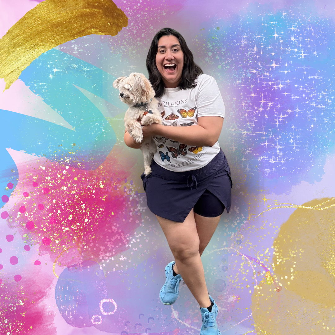 jocelin holding her fluffy dog in a colorful background