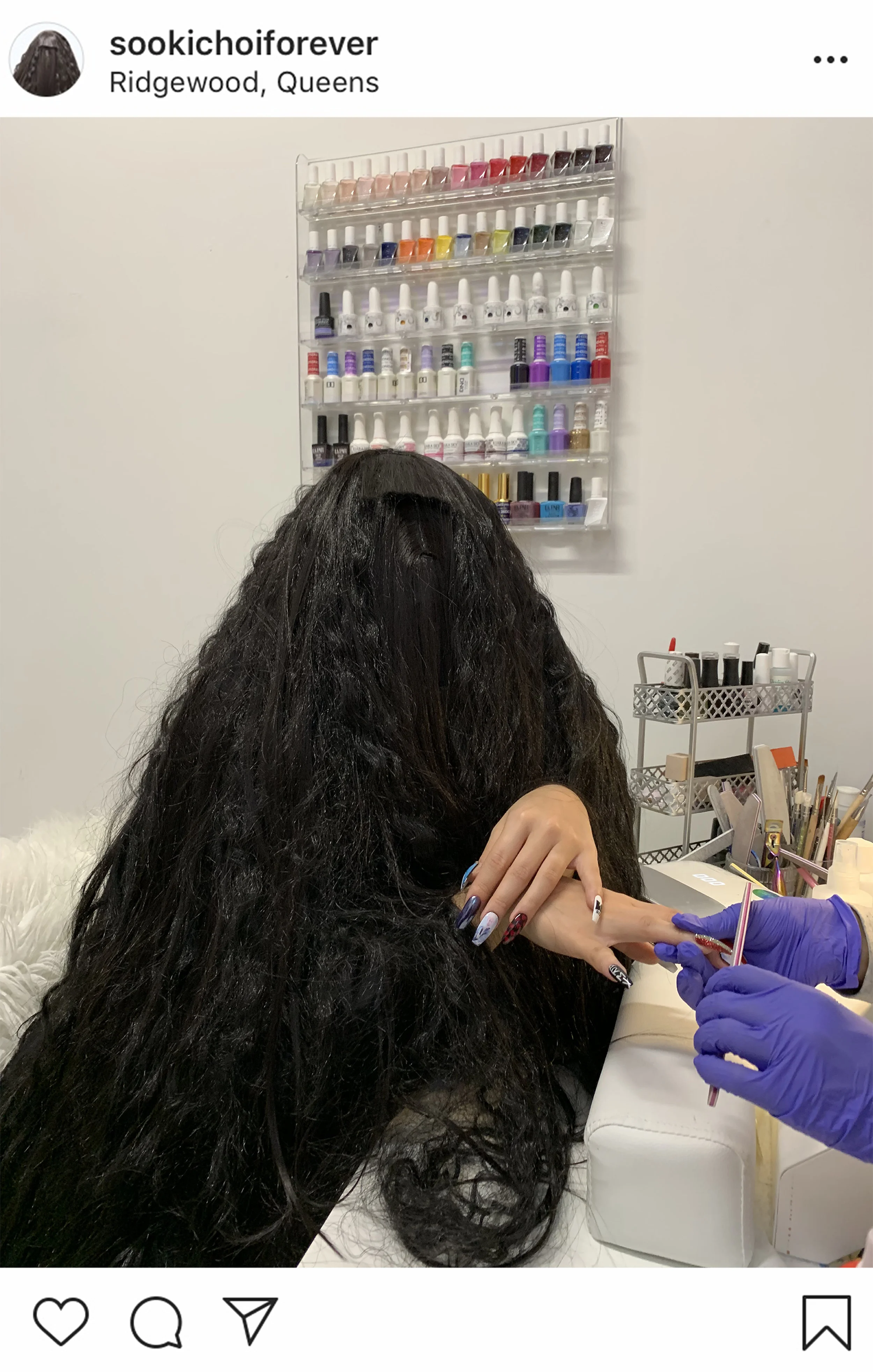 As a nail enthusiast, Sooki likes to get her nails done and share them with her followers. Sooki is always cognizant of the latest trends and cultural phenomenons. In this photograph, she is getting her nails done in a private salon, with pictures of the Korean band BTS imprinted on them.