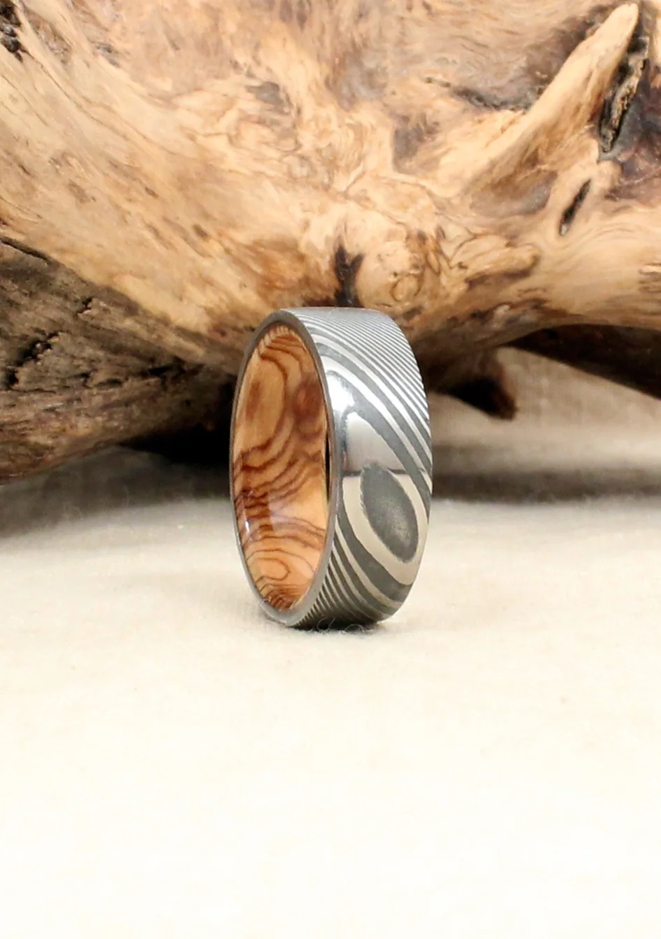 Hand-Wrought Twisted Damascus Steel and Bethlehem Olivewood Wooden Ring