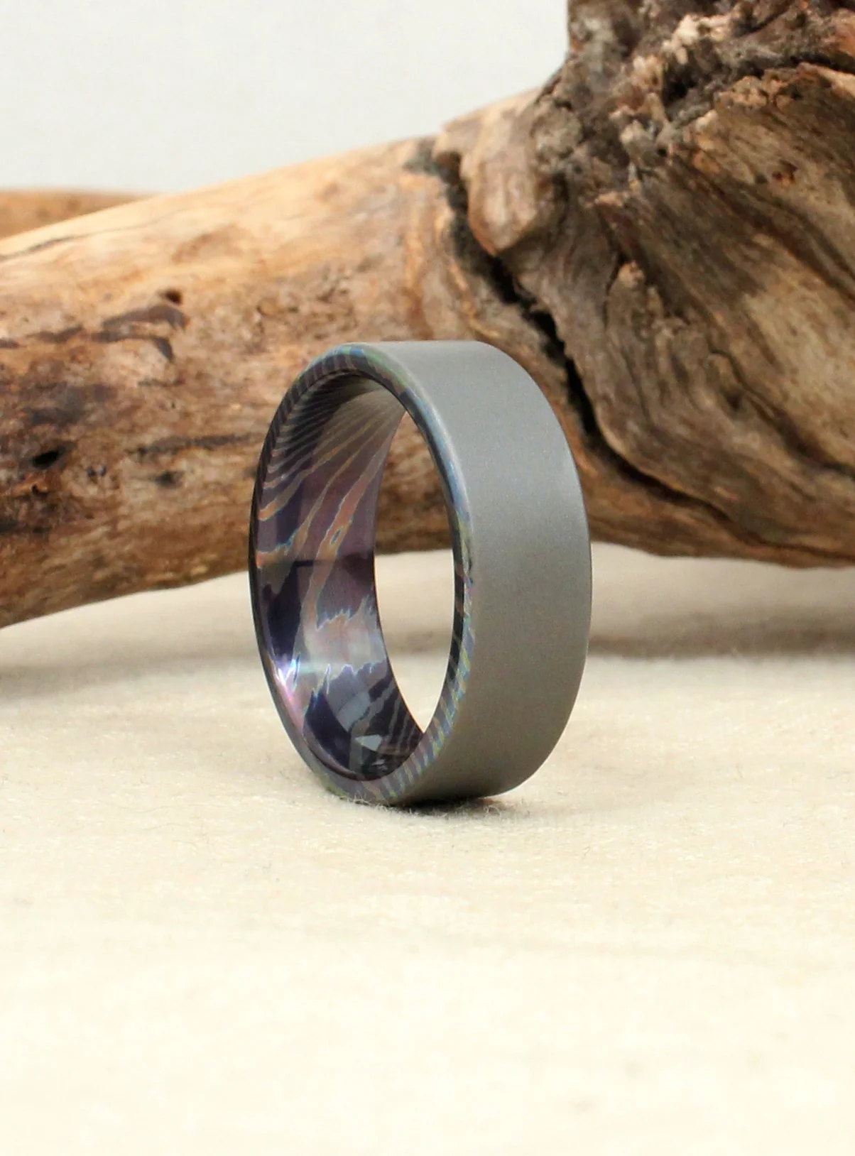 mokuti-ring-titanium-wedding-band-damascus-wedgewood.jpg