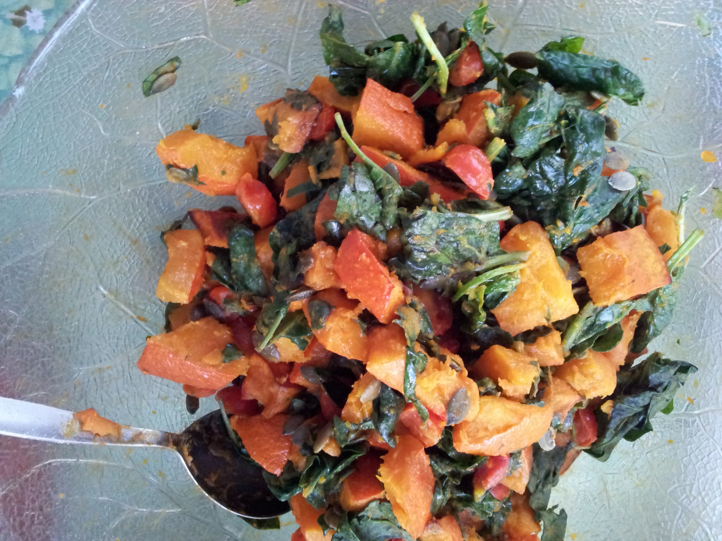 Pumpkin spinach salad with cherry tomatoes
