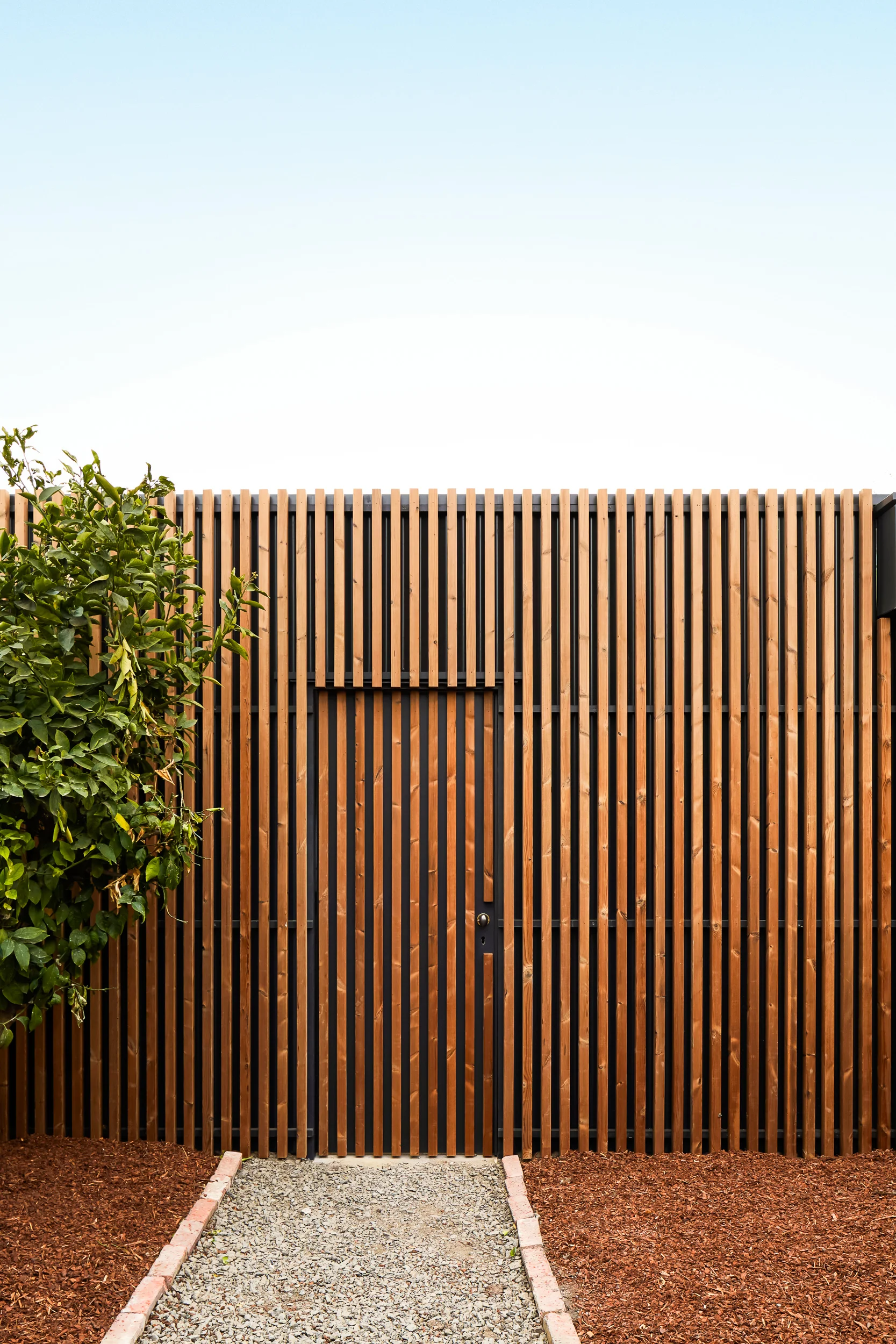 External vertical timber cladding to the new outbuilding garage, Lunawood