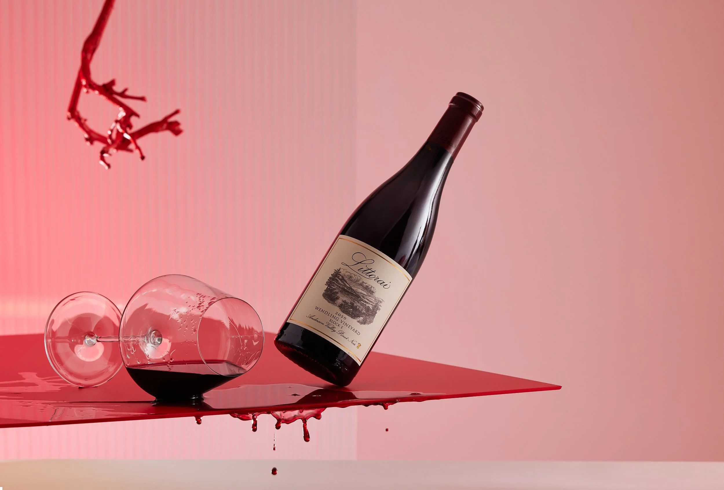 Curated+Grapes+red+wine+and+glass+spilling+wine+on+red+photographed+for+Gruff+design+by+Sarah+Anderson+Photography.jpg
