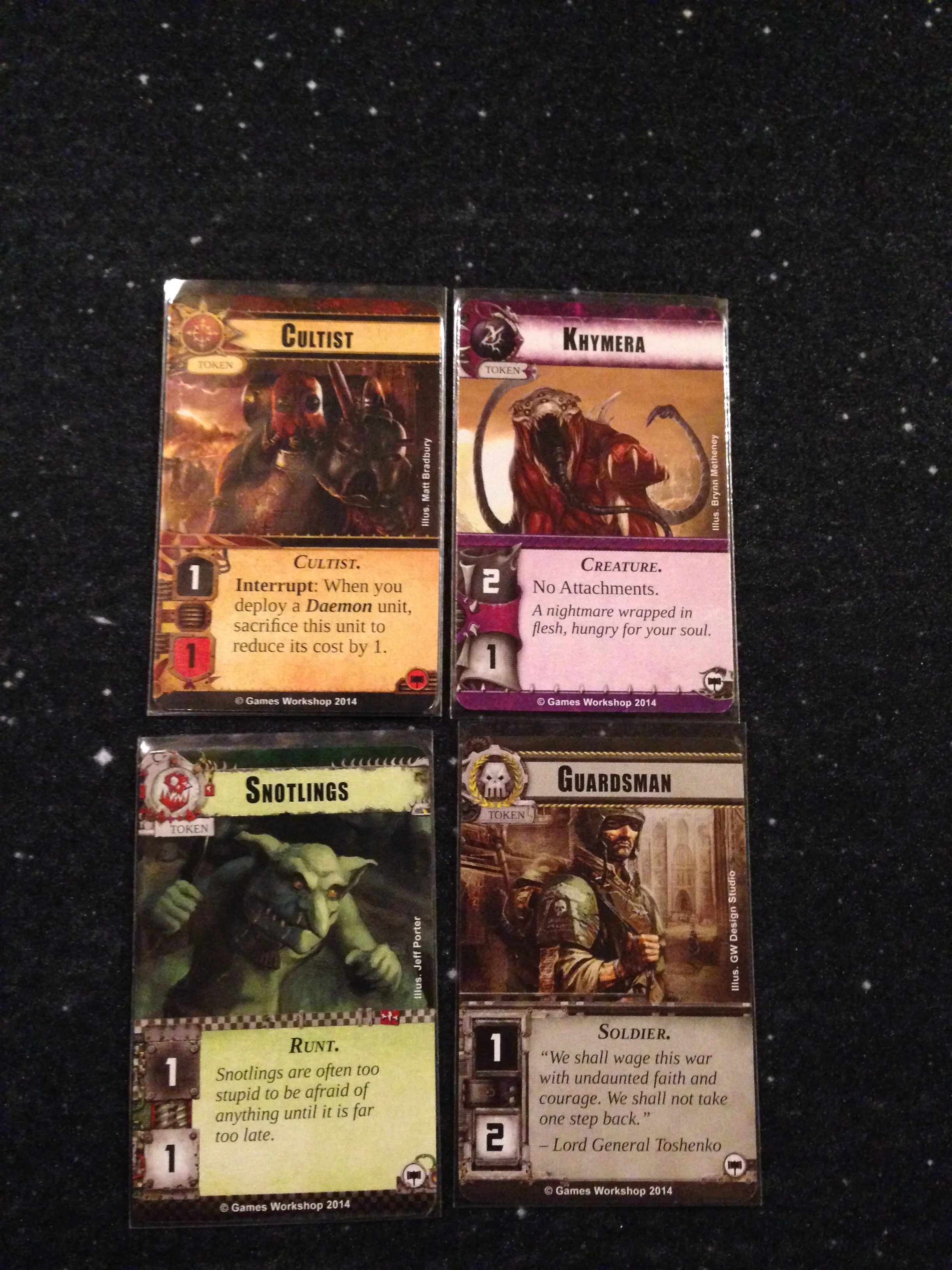 these are the smaller "token" cards some of the factions use.