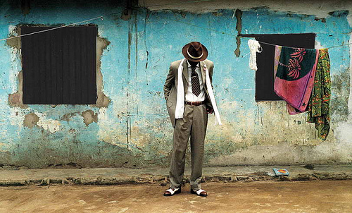 Bienvenu Mouzieto in the Bacongo neighborhood. Source: NPR "The Surprising Sartorial Culture Of Congolese 'Sapeurs'"