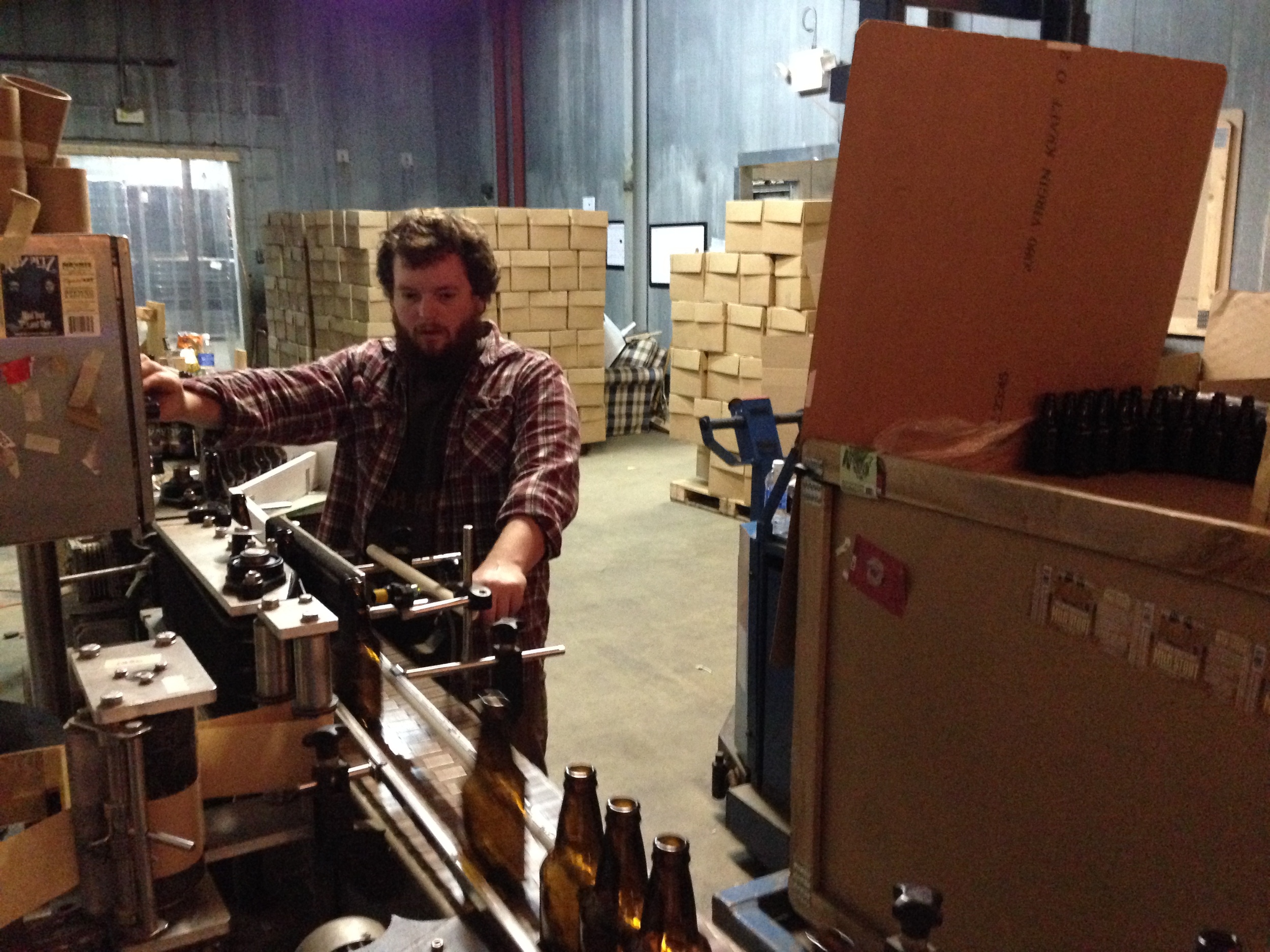 Danny labeling our bottles